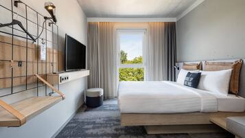 Room, 1 Queen Bed, City View | Desk, laptop workspace, blackout curtains, soundproofing