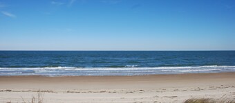 Old Time Beach Front Cottage - The Beach is your Backyard! (Pet Friendly) by RedAwning