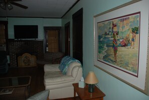 TV, fireplace, books