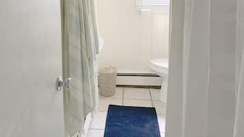 Shower, towels, soap, toilet paper