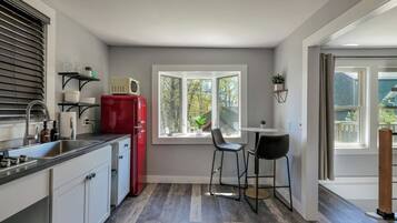 Fridge, microwave, stovetop, coffee/tea maker