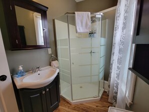 Bathtub, hair dryer, towels