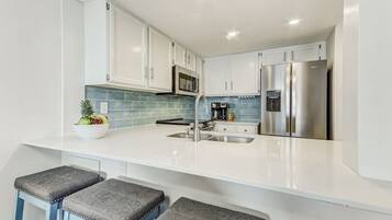 Condo, Multiple Beds, Private Pool, Beach View | Private kitchen | Fridge, microwave, oven, stovetop