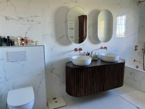 Hair dryer, towels, soap, toilet paper