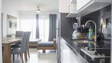 Fridge, microwave, stovetop, coffee/tea maker