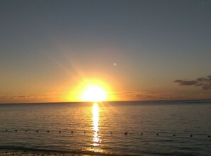 On the beach, beach towels - Private and Fully equipped and furnished Family House Facing the Beach (Flic en Flac)