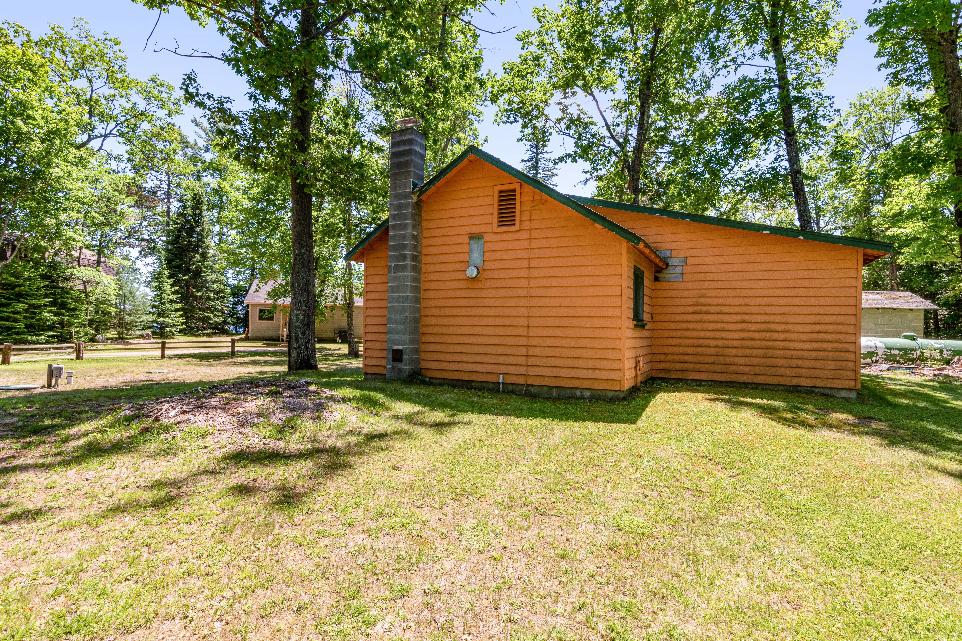 Lakefront cabin at Scott’s Twin Lake Resort with swimming beach, docks