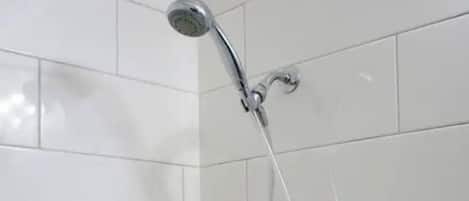 Combined shower/tub, hair dryer, towels, soap