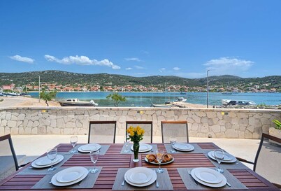 Beach House Joy - charming waterfront villa with a heated pool for 8 guests by MyWaycation