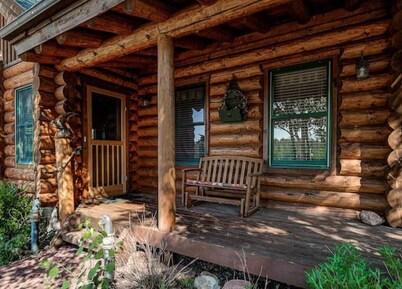 Log cabin style home on secluded 48 acre property
