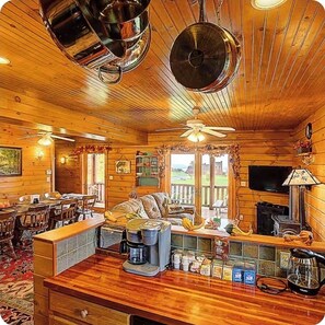 Smart TV, fireplace, table football, books