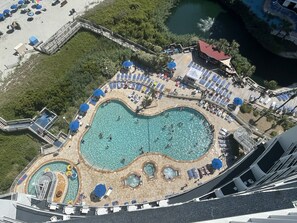 Relax by the central pool or unwind in one of the smaller pools, surrounded by sun loungers and umbrellas.