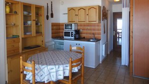 Fridge, microwave, toaster, cookware/dishes/utensils