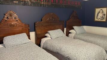 Habitació familiar | Roba de llit d'alta qualitat i matalassos amb encoixinament addicional