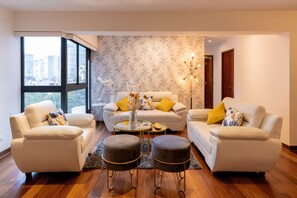 Deluxe Apartment, Poolside | Living area