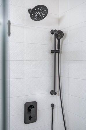 Shower, hair dryer, soap, shampoo
