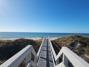 On the beach, sun loungers, beach towels