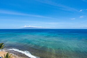 On the beach, sun loungers, beach towels