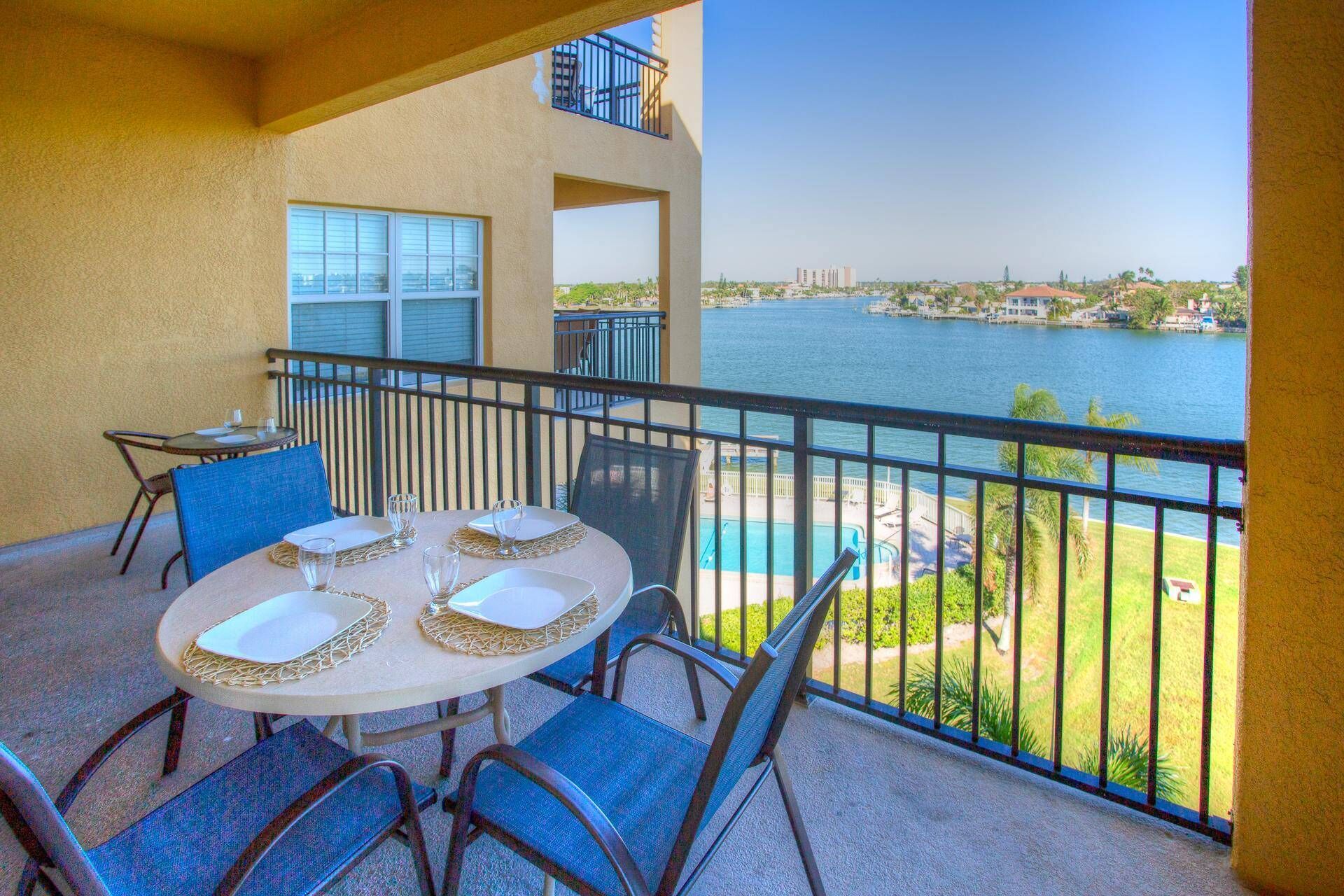 Florida’s Finest Beaches, And What A View! Waterfront Heated Pool. Next to Shops. No Car Needed.
