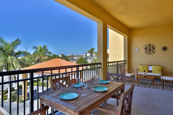 Spacious Balcony with Water Views, Outdoor Dining and Seating.