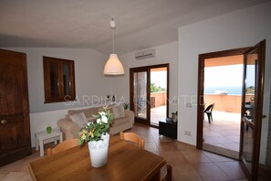 Living area - Casa Rosa Arancio: wonderful seaview, shared pool, terraces and BBQ - Sardinia Unlimited (Costa Paradiso)