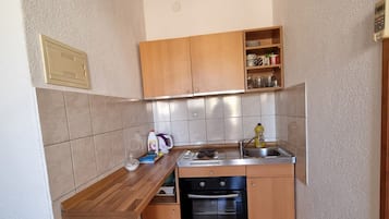 Apartment (Two Bedroom Apartment with Terrace) | Private kitchen | Fridge