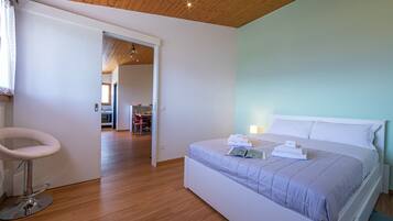 Family Apartment, Multiple Bedrooms, Mountainside (Petit Cadeau) | 1 bedroom, laptop workspace, free WiFi, bed sheets