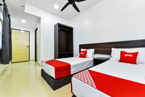 Habitación Deluxe con 2 camas individuales | Escritorio, wifi gratis y ropa de cama 