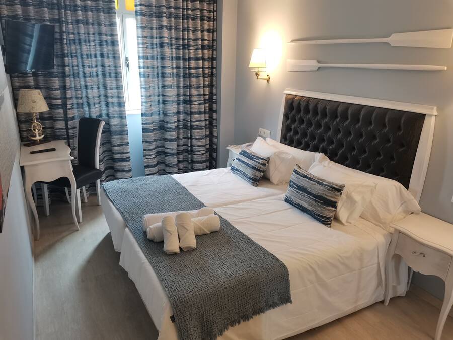 Doppel- oder Zweibettzimmer