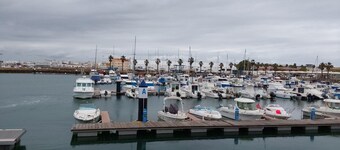 Apartamento El Mirador del Cantil cerca de la playa con piscina compartida y aire acondicionado