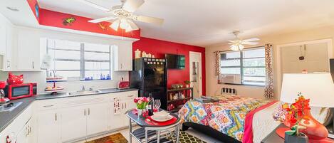 Fridge, microwave, stovetop, coffee/tea maker