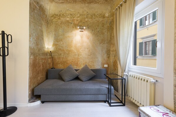 Deluxe-Apartment | Wohnbereich | Flachbildfernseher