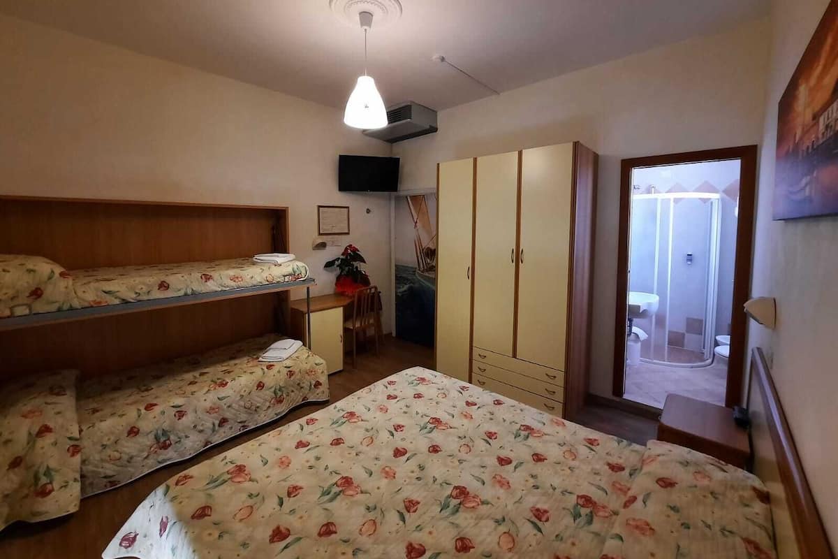 Standard Quadruple Room | In-room safe, desk, WiFi (surcharge), bed sheets