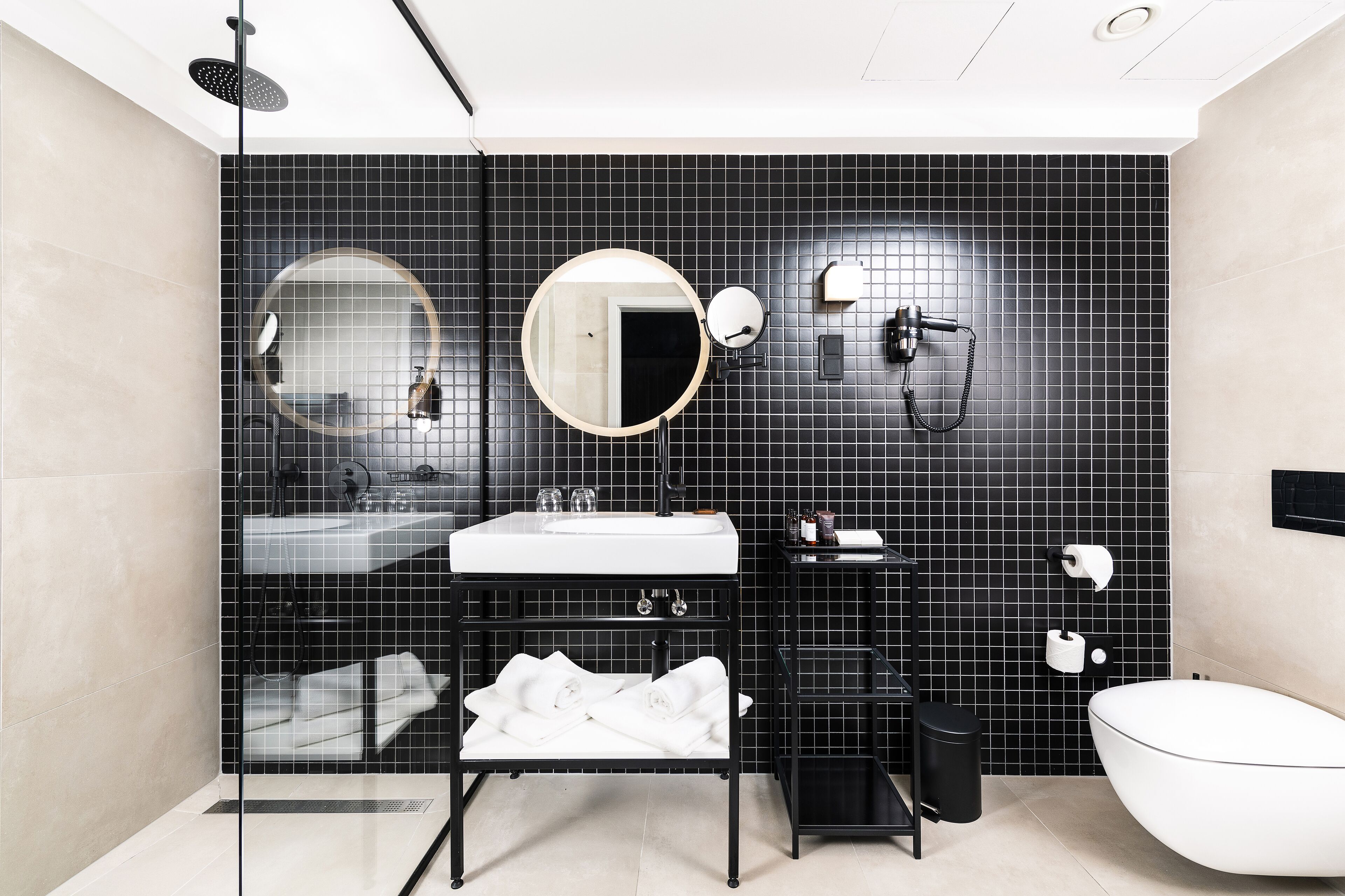 limited suite | bathroom | eco-friendly toiletries, hair dryer, towels, soap