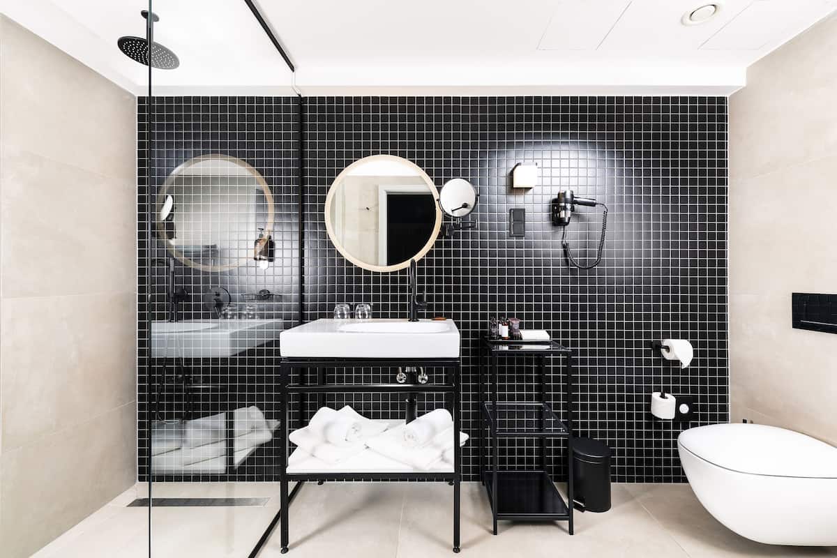 limited suite | bathroom | eco-friendly toiletries, hair dryer, towels, soap