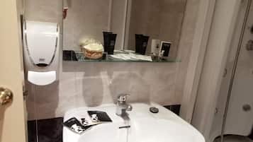 Combined shower/bathtub, hydromassage showerhead, hair dryer