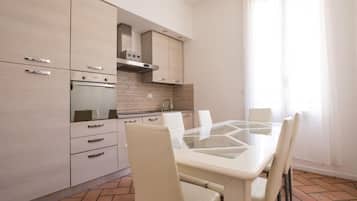 Comfort Apartment | Private kitchen | Fridge, microwave, oven, stovetop