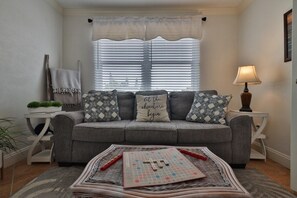 House, 3 Bedrooms | Living area - 813 E 6th Ave 3 Bedroom Home by RedAwning (New Smyrna Beach)