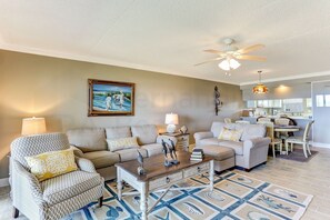 Living area - Recently Renovated Beach Condo with Large Patio Deck and Ocean View by RedAwning (Fernandina Beach)