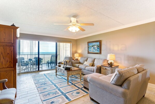 Condo, 2 Bedrooms | Living area | TV - Recently Renovated Beach Condo with Large Patio Deck and Ocean View by RedAwning (Fernandina Beach)
