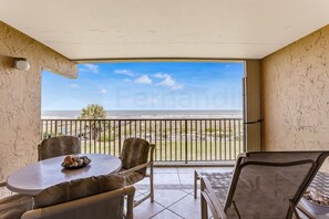 Condo, 2 Bedrooms | Outdoor dining - Recently Renovated Beach Condo with Large Patio Deck and Ocean View by RedAwning (Fernandina Beach)
