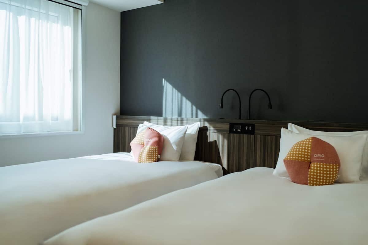 Twin Room, Non Smoking | In-room safe, desk, laptop workspace, blackout drapes