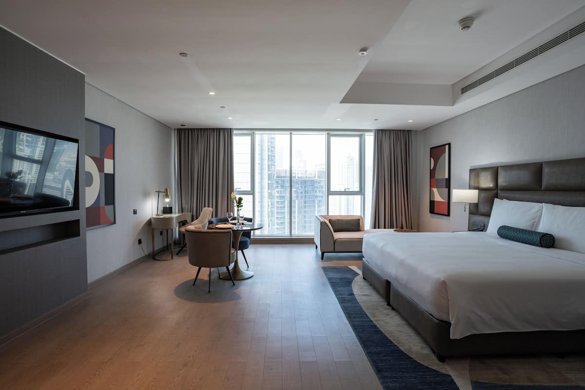 Executive Studio, 1 Queen Bed, Balcony, City View | In-room safe, desk, laptop workspace, soundproofing
