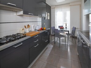 Apartment (Two Bedroom Apartment with Balcony) | Private kitchen | Fridge