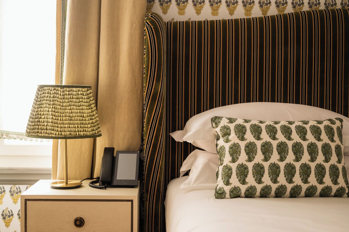 Frette Italian sheets, premium bedding, down duvets, minibar