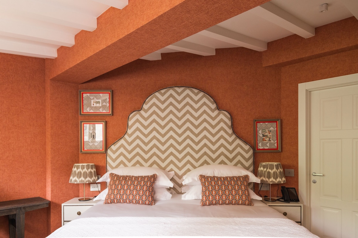 Frette Italian sheets, premium bedding, down duvets, minibar