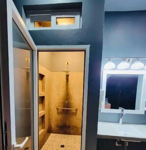 Shower, hair dryer, towels, toilet paper
