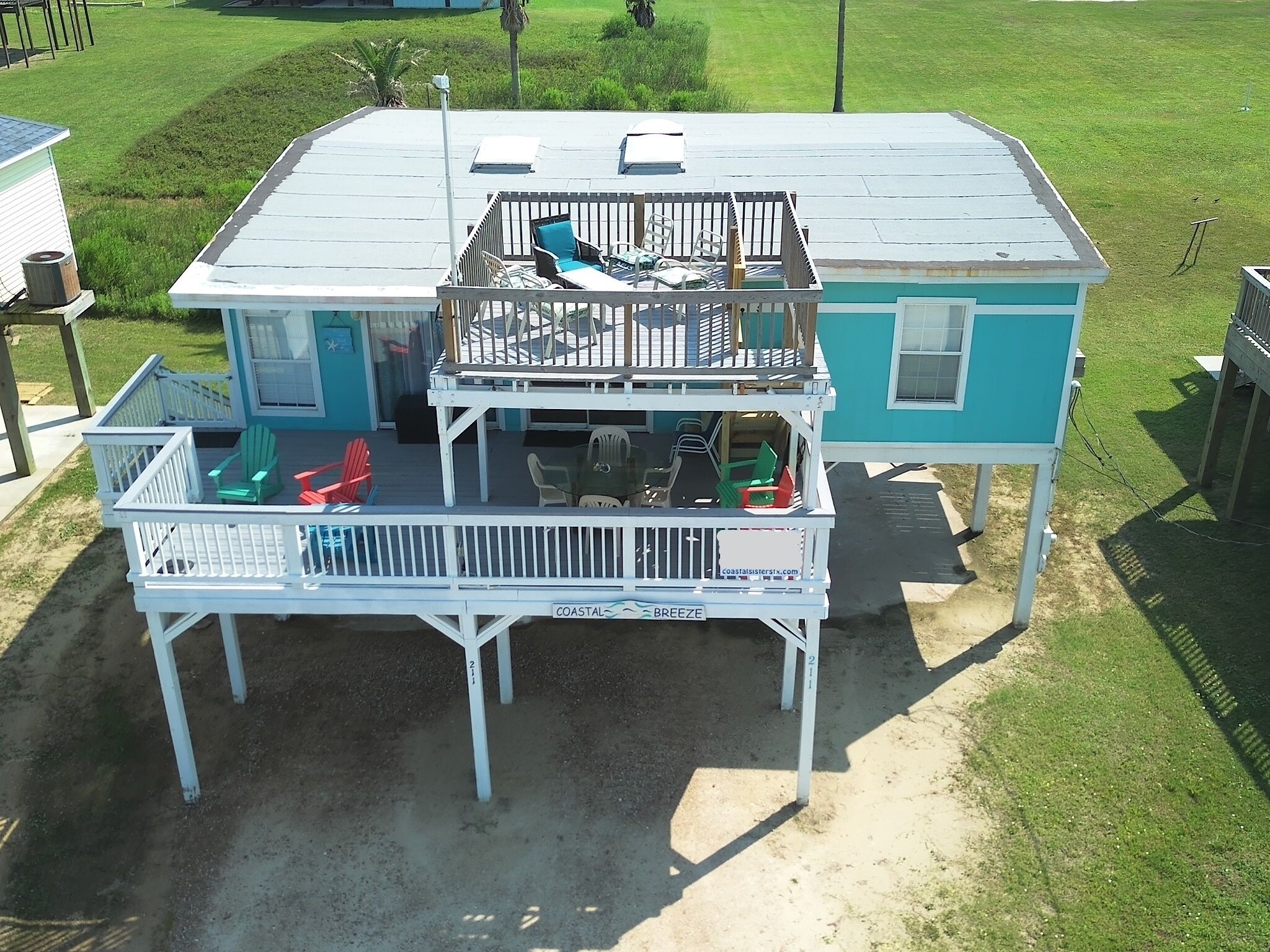 Expansive coastal views from double deck, just steps to pedestrian beach