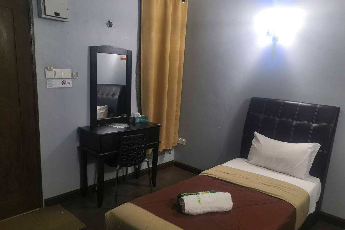 Habitación individual Deluxe | Wifi gratis y ropa de cama