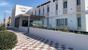 A modern hotel building with a clear sign reading "DON PEPO HOTEL RESTAURANTE." - Hotel Don Pepo (Lobón)